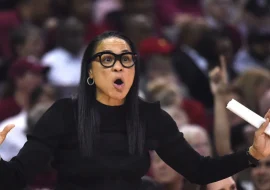 Dawn Staley stays composed after ending UConn’s undefeated run, while Geno Auriemma responds to the tense exchange.