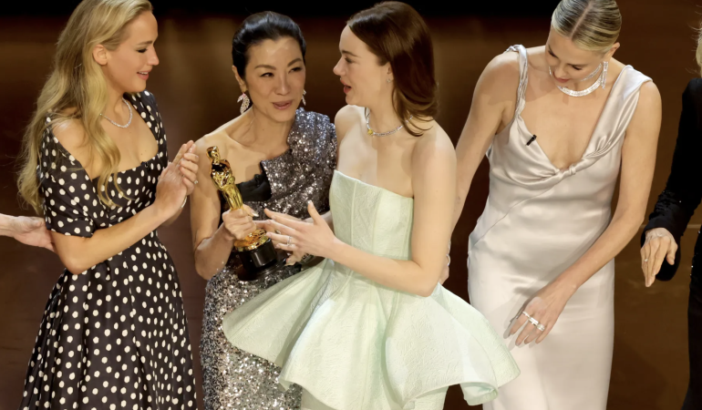 Michelle Yeoh’s Explanation for Passing Emma Stone’s Oscar to Jennifer Lawrence Takes Center Stage in Entertainment News.
