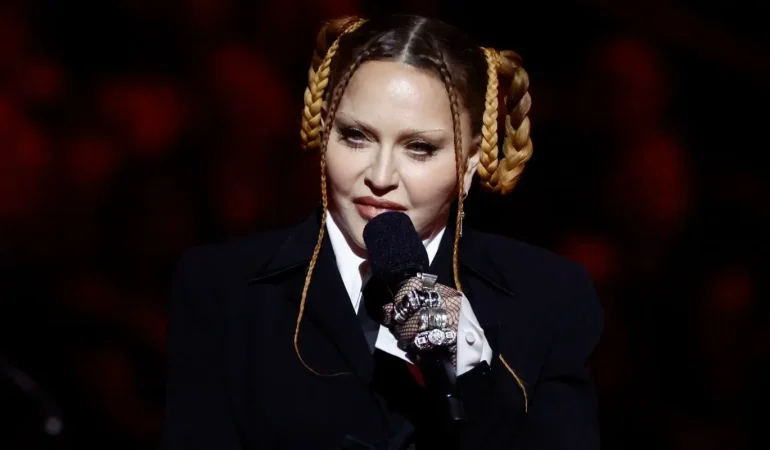 Madonna, 66, rocks a fresh, filler-free glow leaving an art gallery.